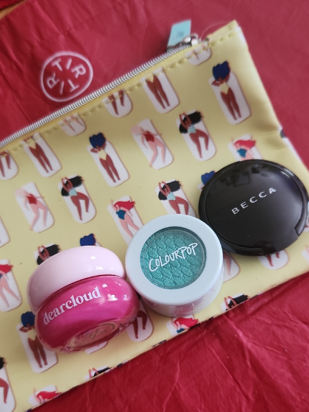 BECCA Champagne Pop Highlighter with Yellow Beach Print Pouch
